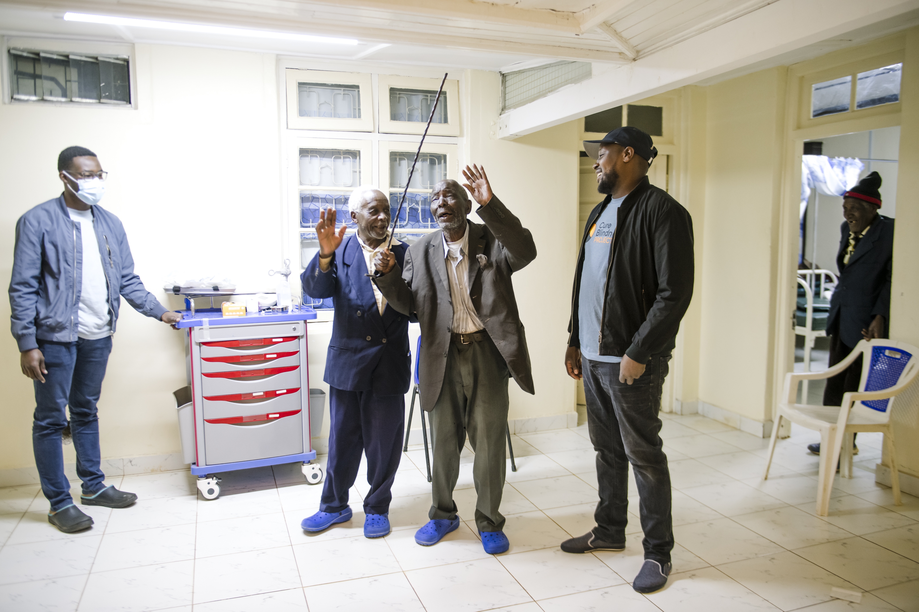 Paul and Stevenson celebrate their restored sight.